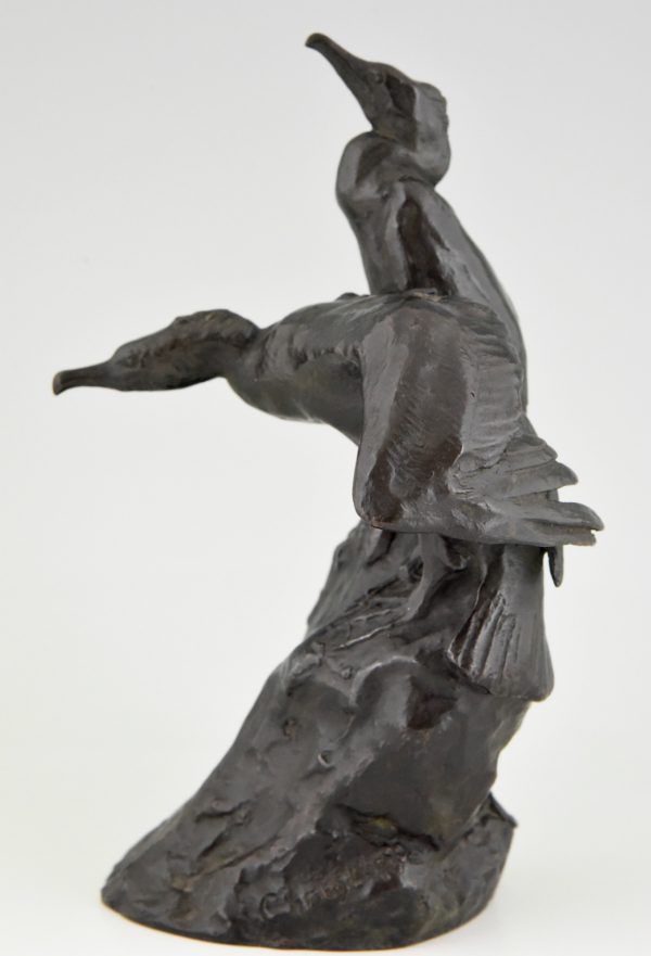 Antique bronze sculpture two cormorants