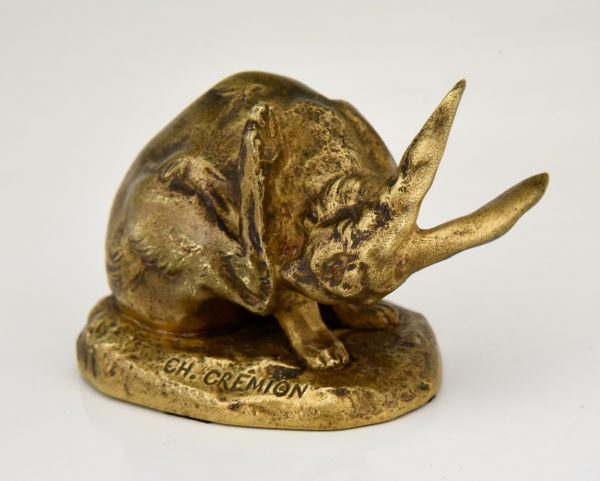 Antique bronze sculpture of a hare washing