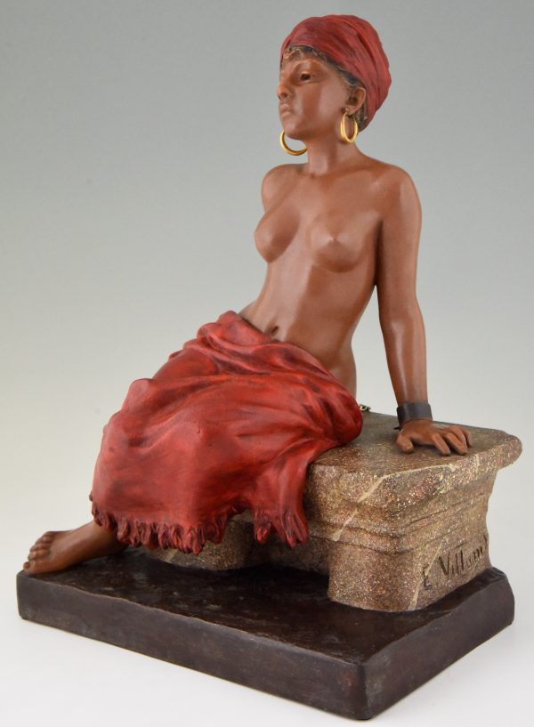 Art Nouveau sculpture of a seated nude with removable skirt.