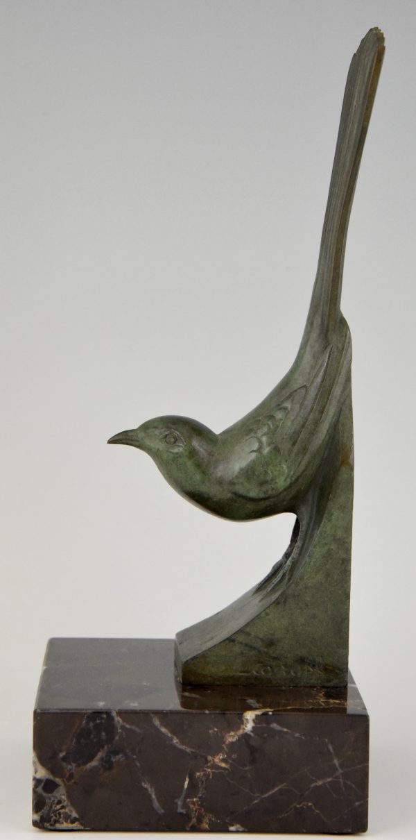 Art Deco bronzen boekensteunen vogels