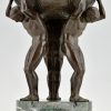 Art Deco bronze sculpture centerpiece with three men.