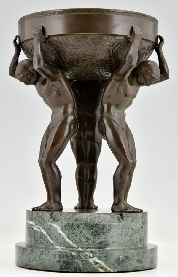 Art Deco bronze sculpture centerpiece with three men.