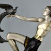Art Deco bronze sculpture lady with birds of paradise.